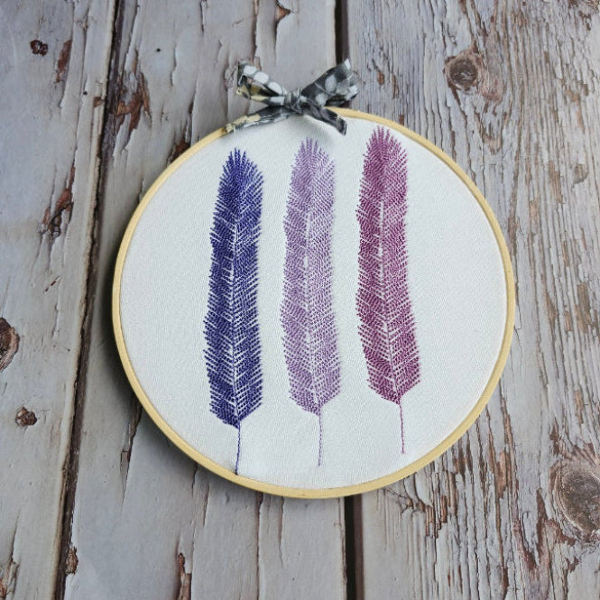 hoop embroidered feathers