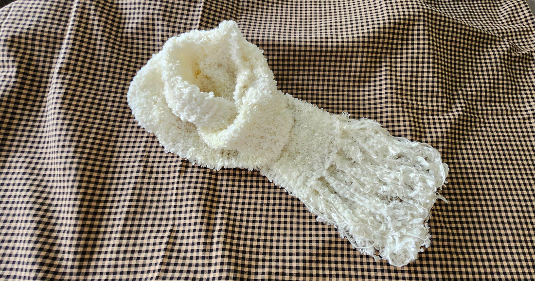 Handmade boho knit scarf styled on a fall jacket by Luniquedesigns