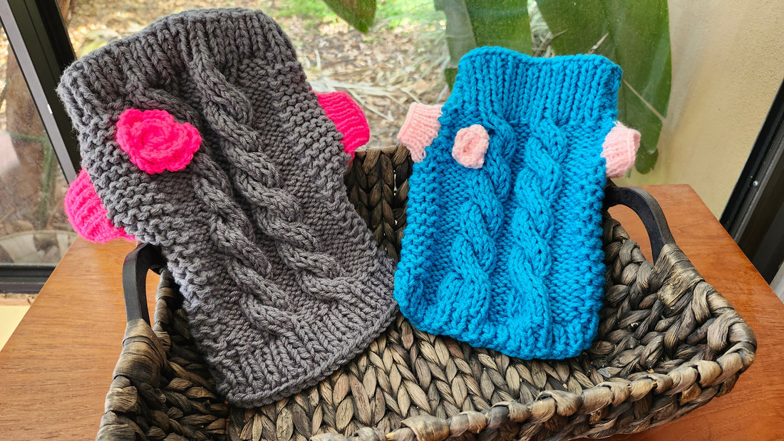 A beautiful, custom-made dog sweater neatly laid out on a clean surface under bright, natural daylight, highlighting the high-quality stitching